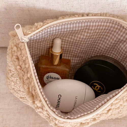 Inside view of camel teddy gingham pouch with zip closure and gingham lining
