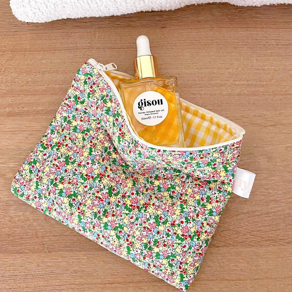Floral flat pouch with drawstring, white trim and yellow gingham lining