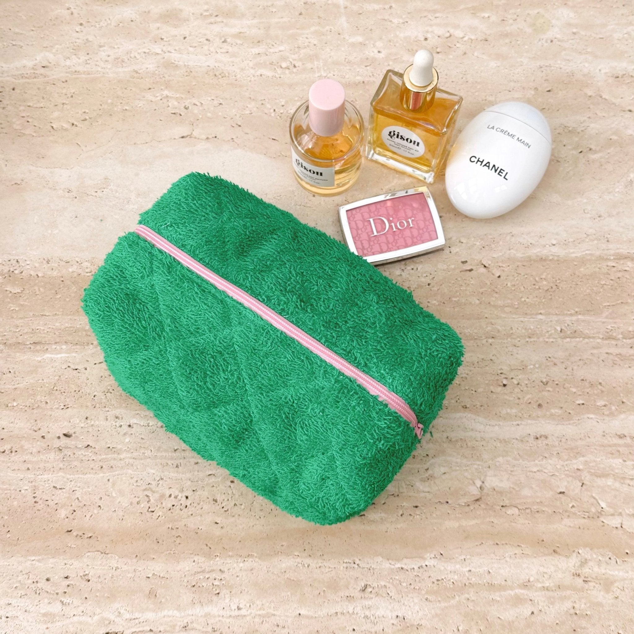 Parakeet green terrycloth makeup pouch with pink zipper stripe, side view