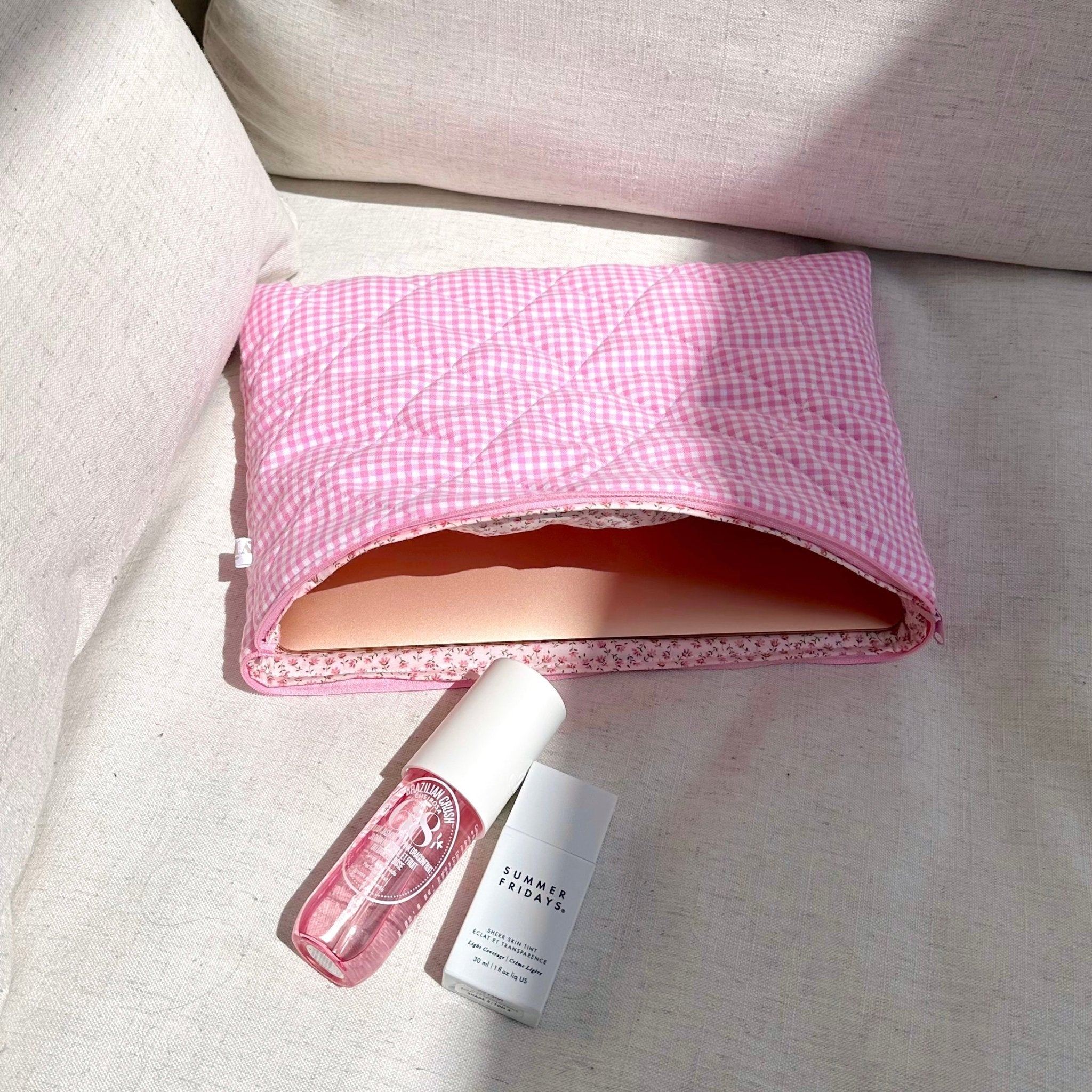 Pink gingham pouch, open zip top with floral lining